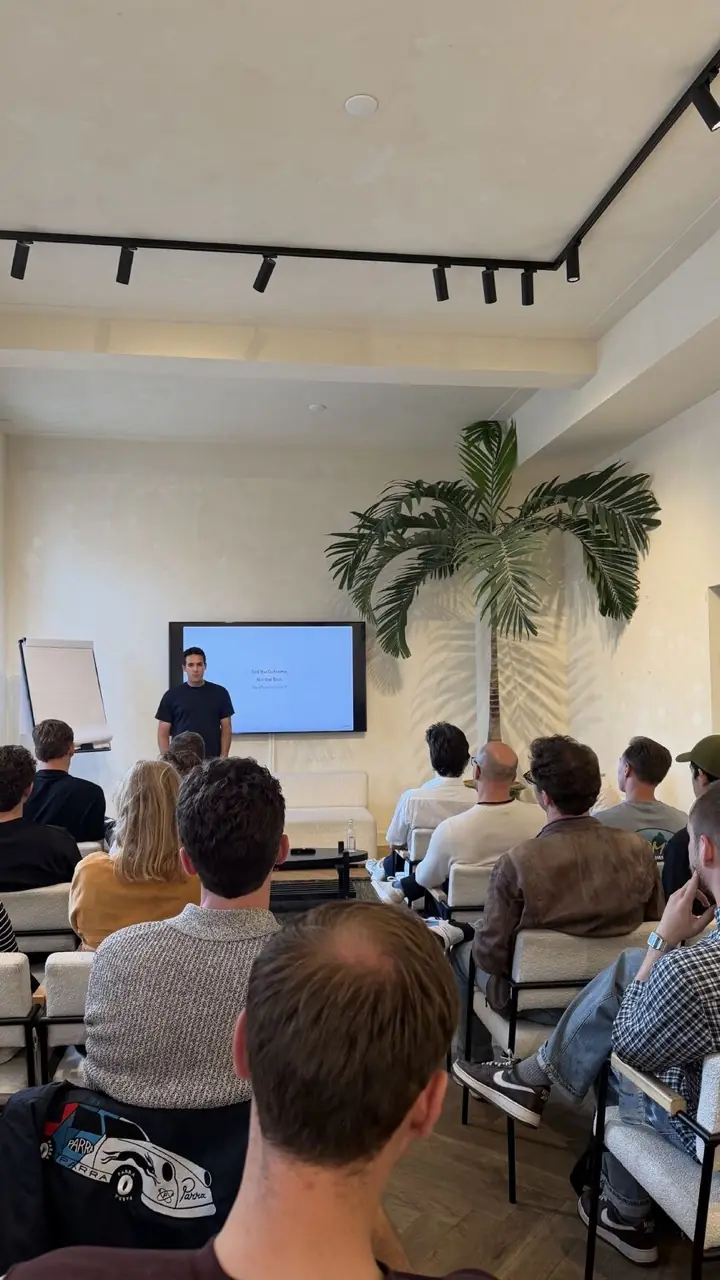 Speaker presenting the “Sell the Outcome, Not the Tool” session to a full room of agency attendees.